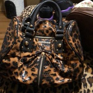 Cute little leapard  purse.
